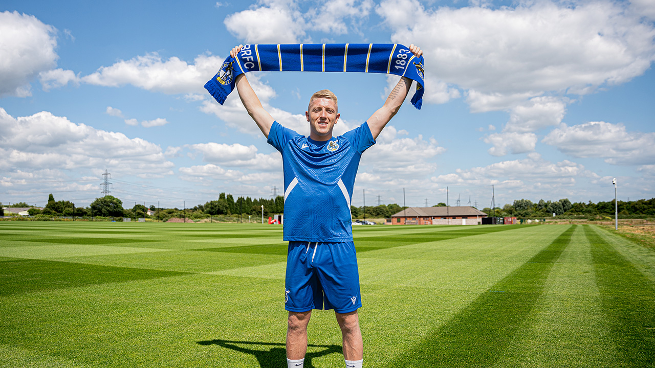 Joel Senior poses with a scarf
