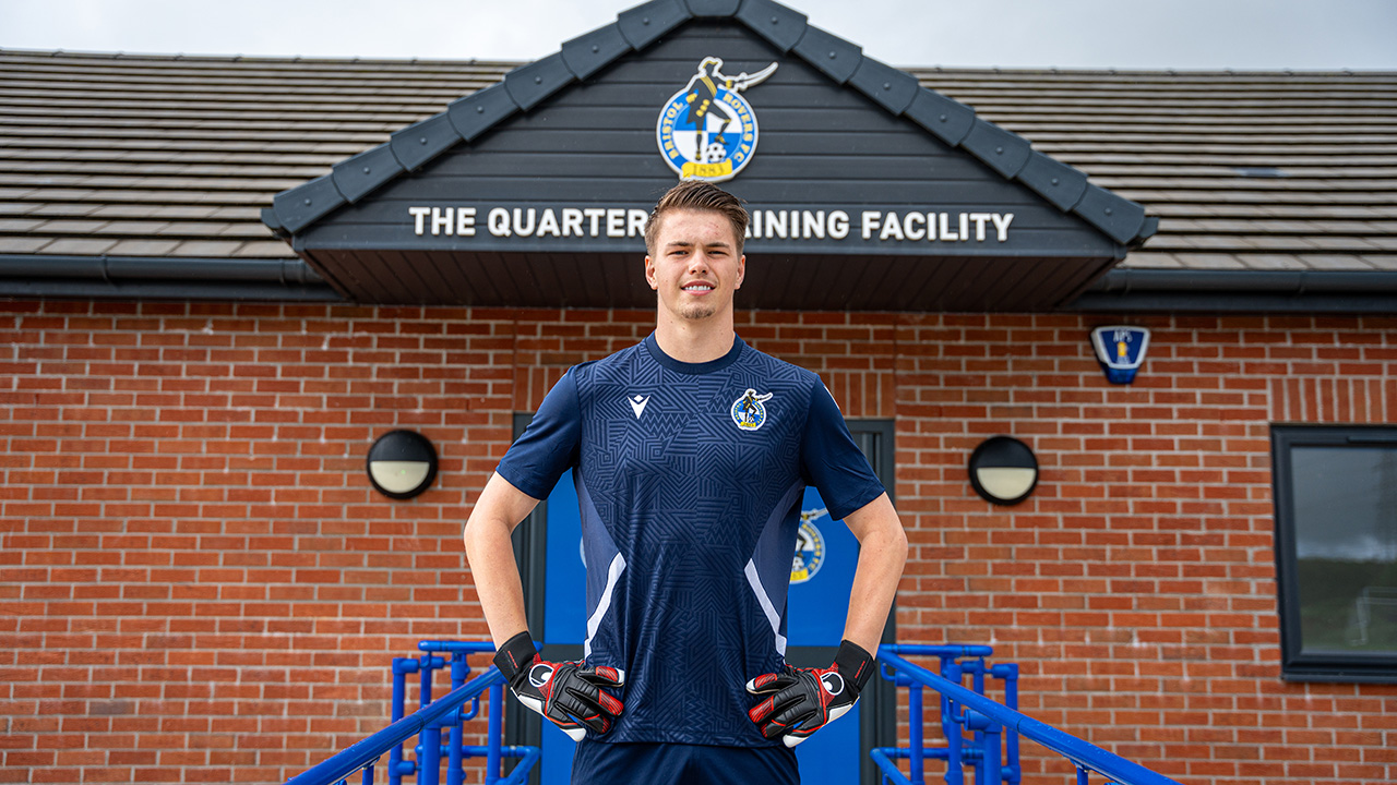 Josh Griffiths poses after signing for Bristol Rovers FC