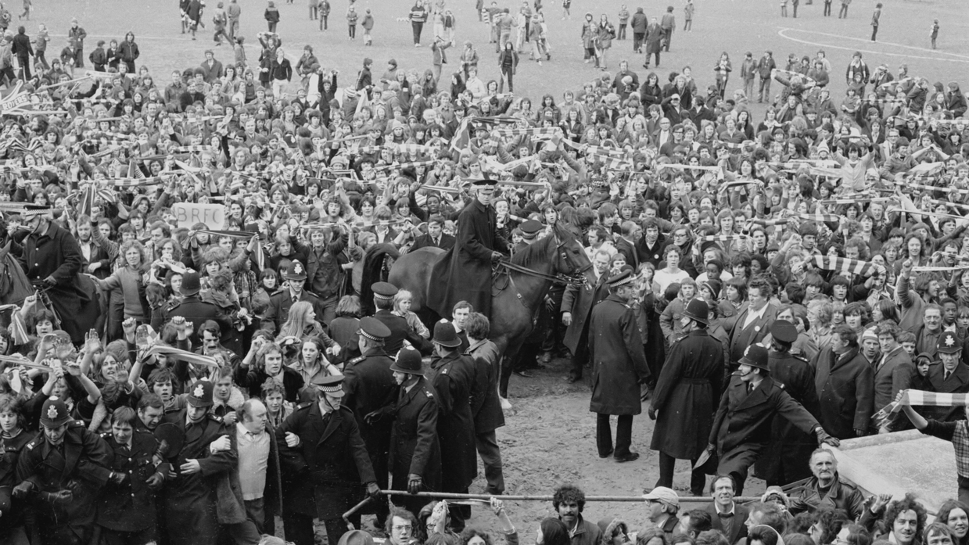 The crowd on the Eastville pitch after the final game of the season against Brighton