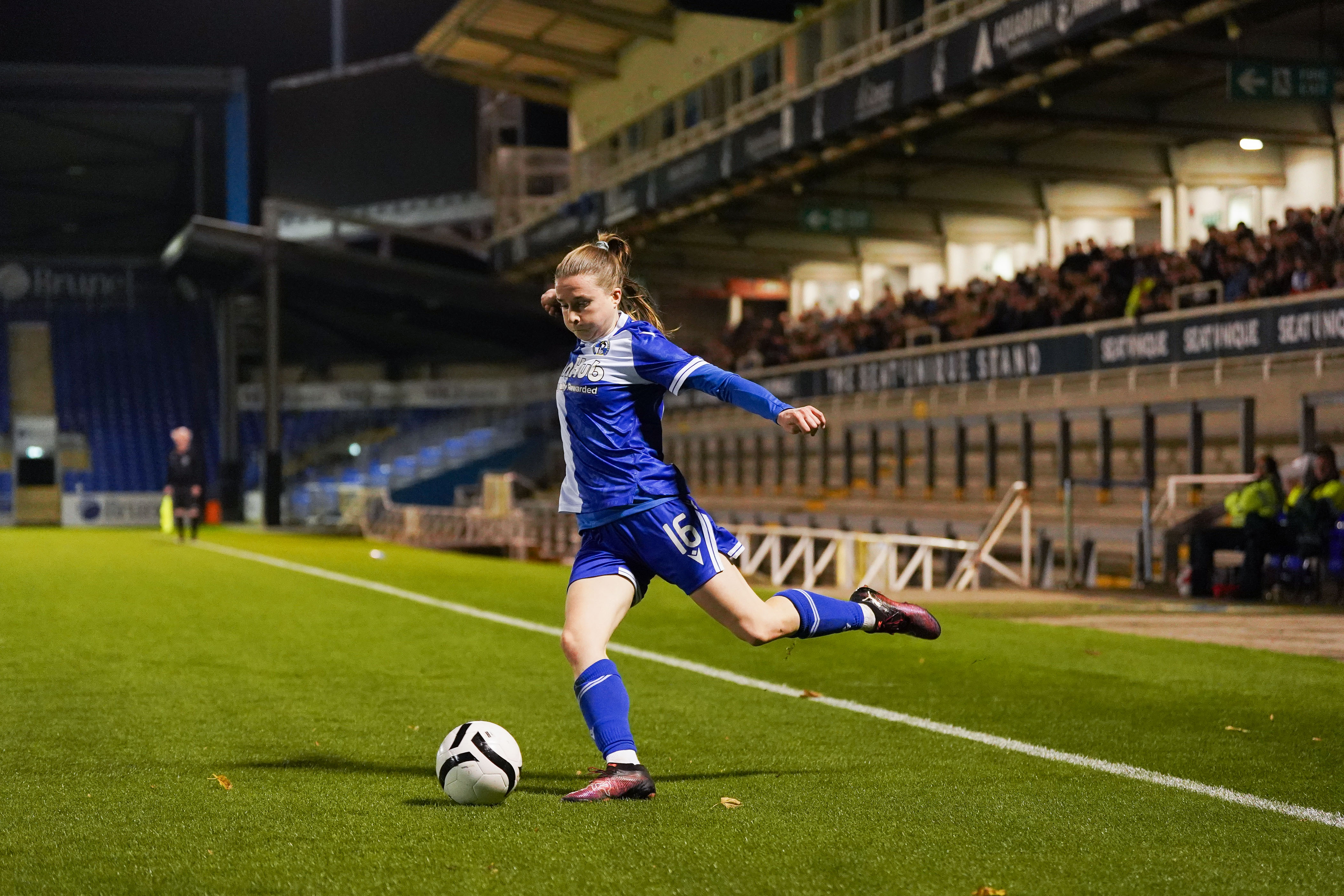 Bristol Rovers Women player in front of West Stand