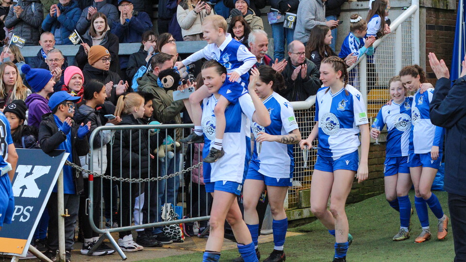 Rianne Bourne Hallett, Charlie Rowlands, Katie Davies, Abi Todd and Poppy Warren walking out of the tunnel at the Memorial Stadium.