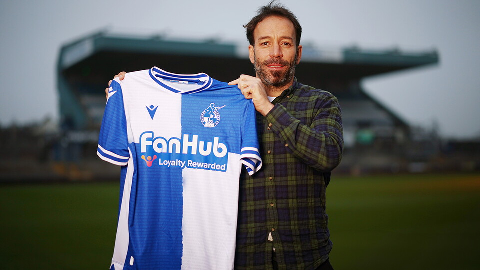 Inigo Calderon poses with a shirt