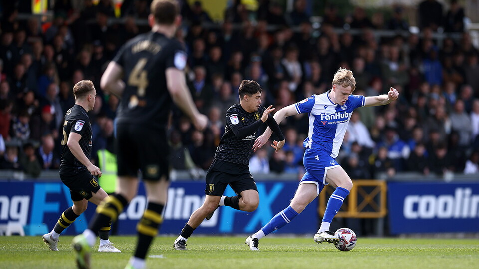 Connor Taylor runs with the ball