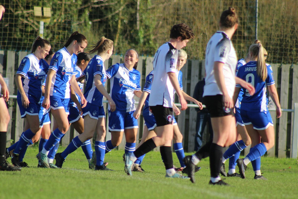 Bristol Rovers' Jodie Exley celebrates with the team after scoring against Portishead Town.