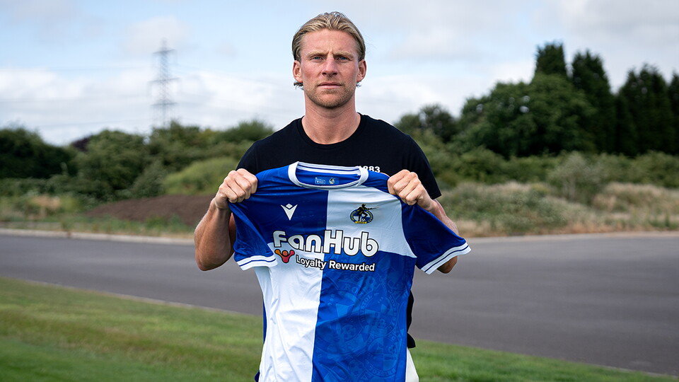 Alfie Kilgour holds a Rovers shirt