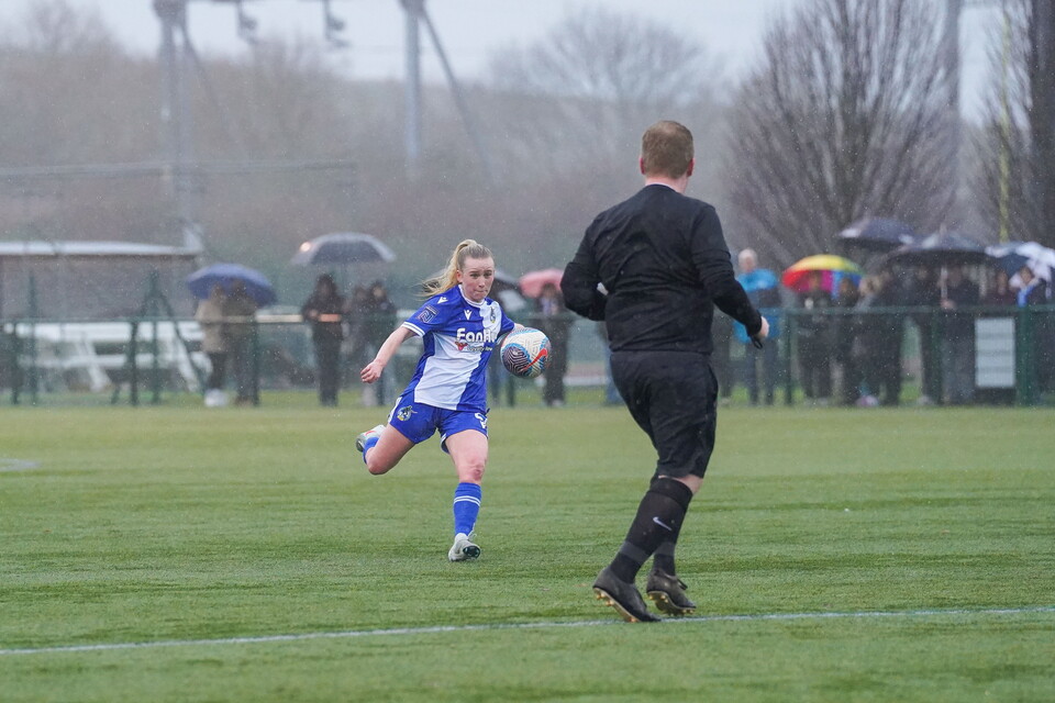 Ruby Scahill volleys the ball