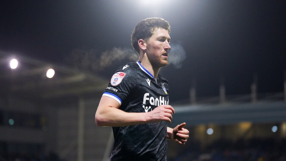 A close up shot of Richie Smallwood running during the Oldham away fixture