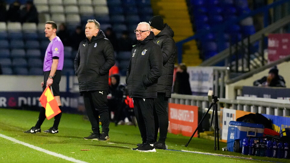 Steve Evans watching his team at the Oldham away fixture