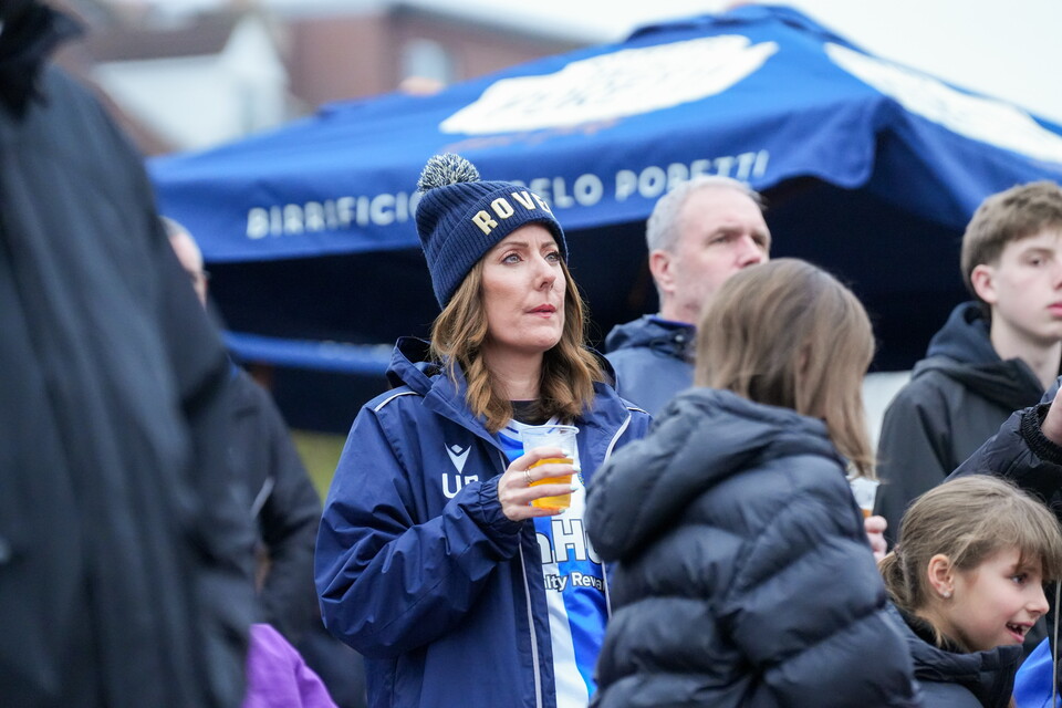 Bristol Rovers fan in Fanzone with drink