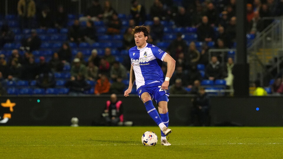 Riley Harbottle with the ball on the pitch in his match against Shrewsbury Town