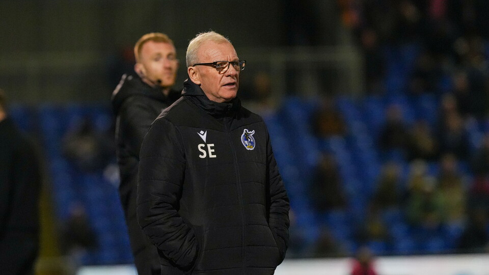 Steve Evans watching from the dugout during the second half