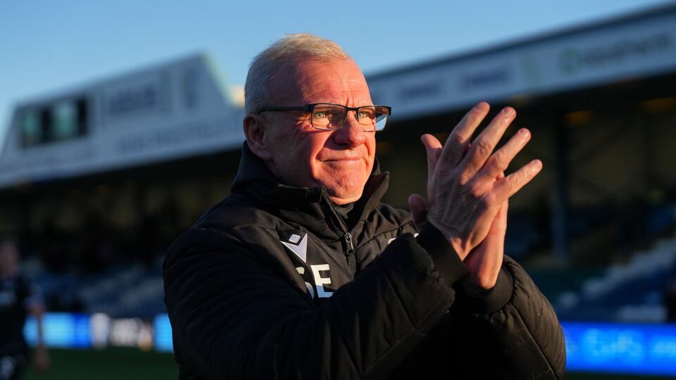 Steve Evans applauds the Gasheads after the Gillingham match