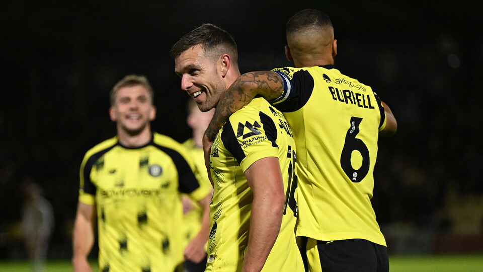 Jack Muldoon of Harrogate Town celebrates after scoring the team's first goal
