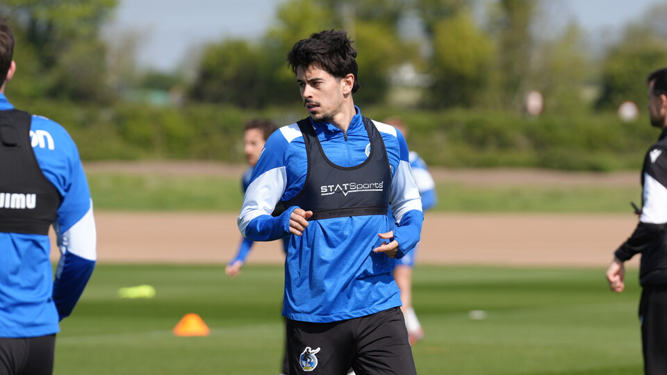 Ryan de Havilland warming up on the training pitch