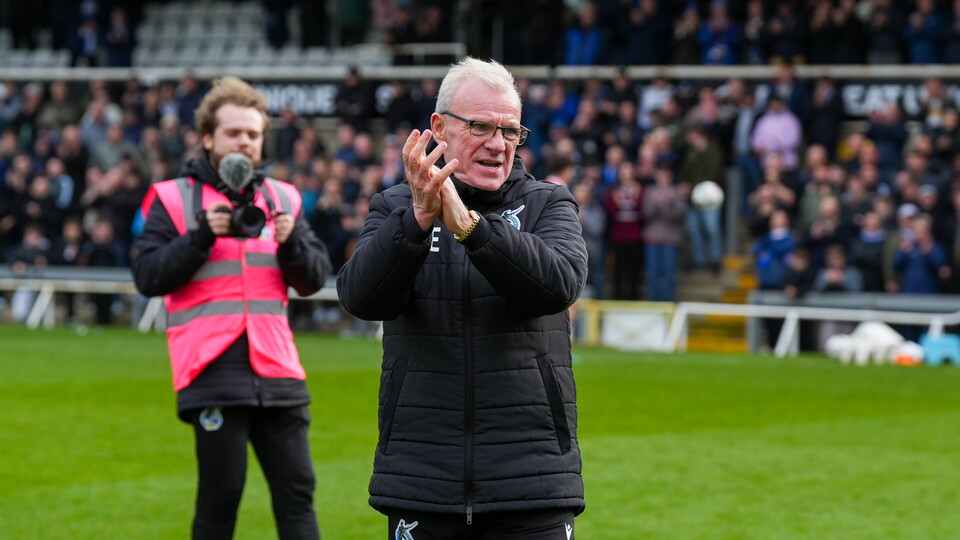 Steve Evans celebrates Rovers' victory over Fleetwood 
