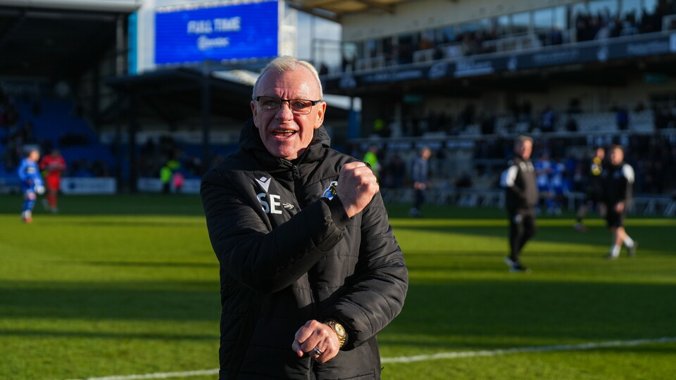Steve Evans celebrates Rovers' win over Accrington Stanley
