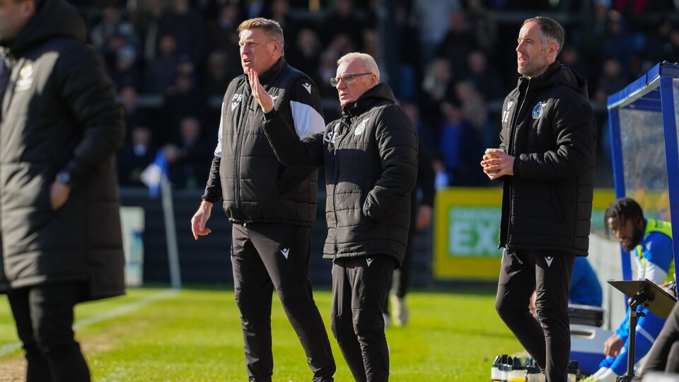 Steve Evans and Paul Raynor talking during the match against Accrington