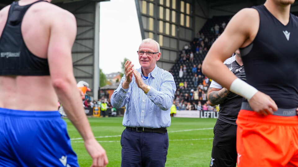 Steve Evans applauds the Gasheads after Bristol Rovers' match against Notts County