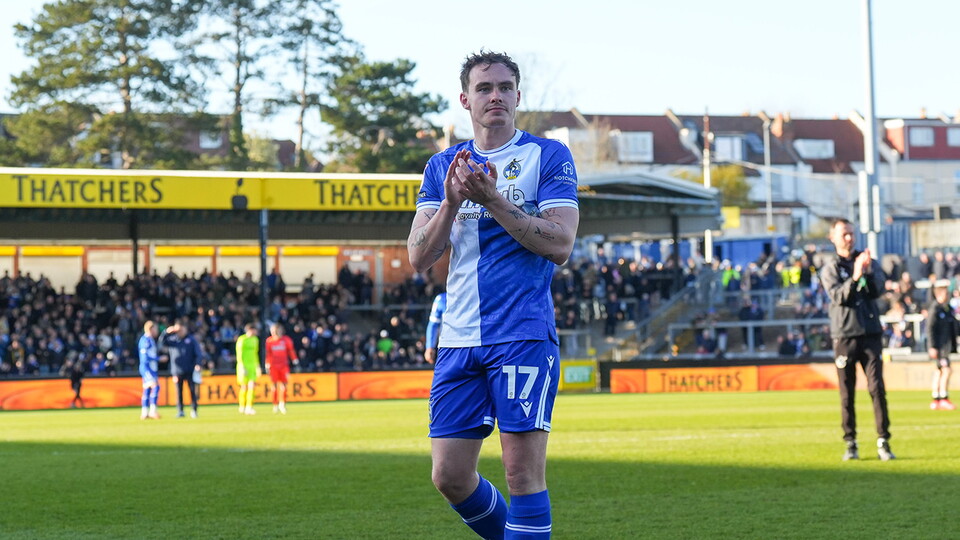 Kofi Balmer claps the Bristol Rovers fans