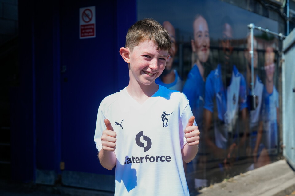 Fan wearing Bristol Rovers 2026/27 Secondary Kit