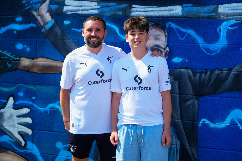 Fans wearing Bristol Rovers 2026/27 Secondary Kit