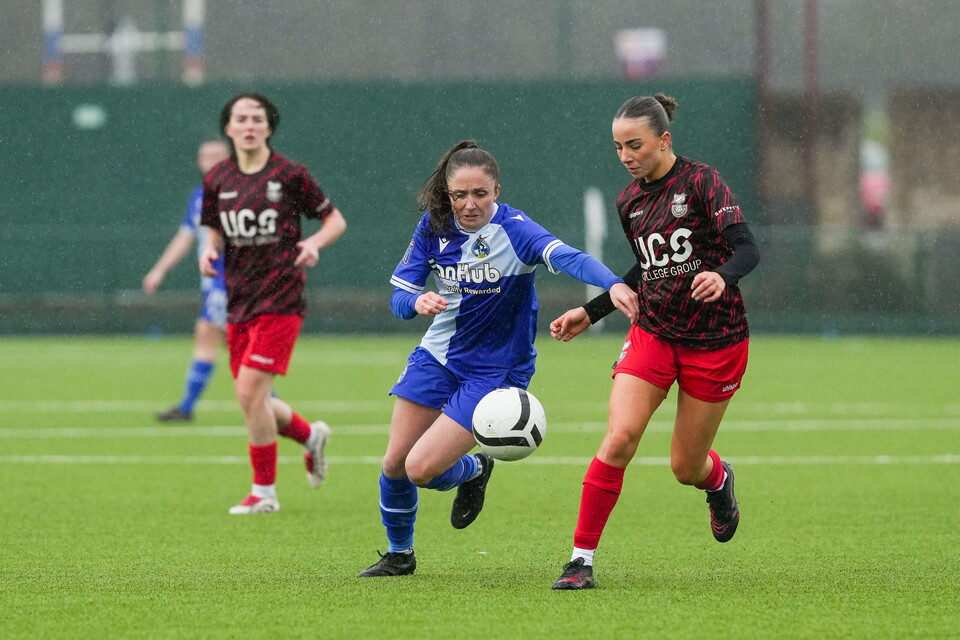 Chloe Bassett holds off a defender