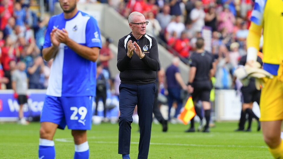 Steve Evans applauds after the York City match