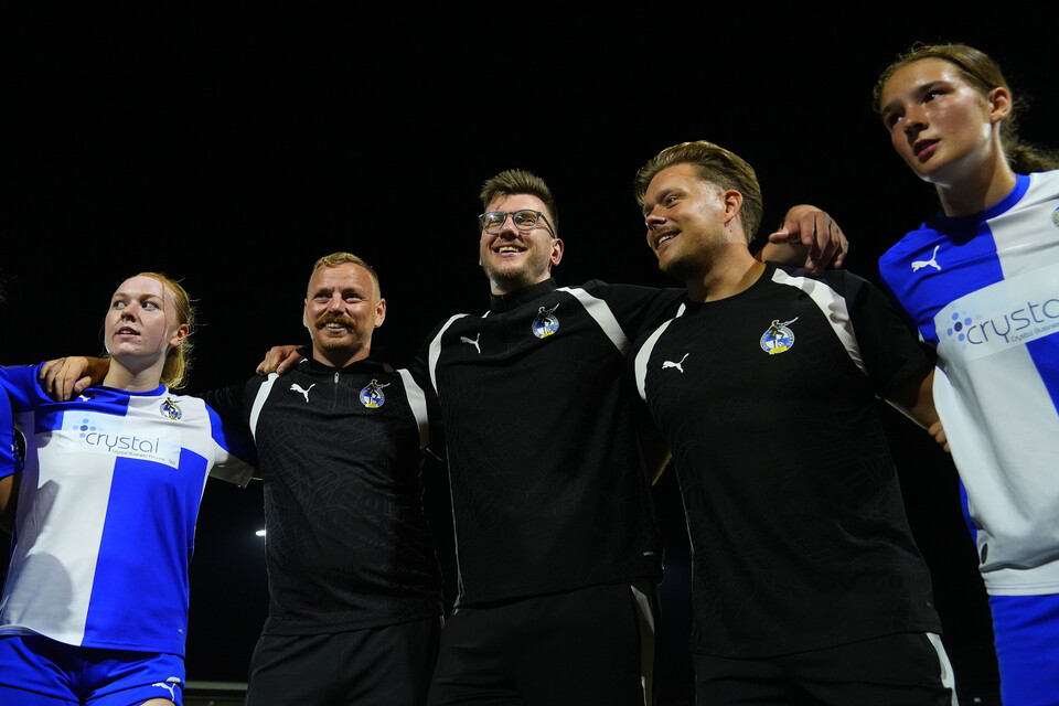 Nathan Hallett-Young and Staff in a huddle