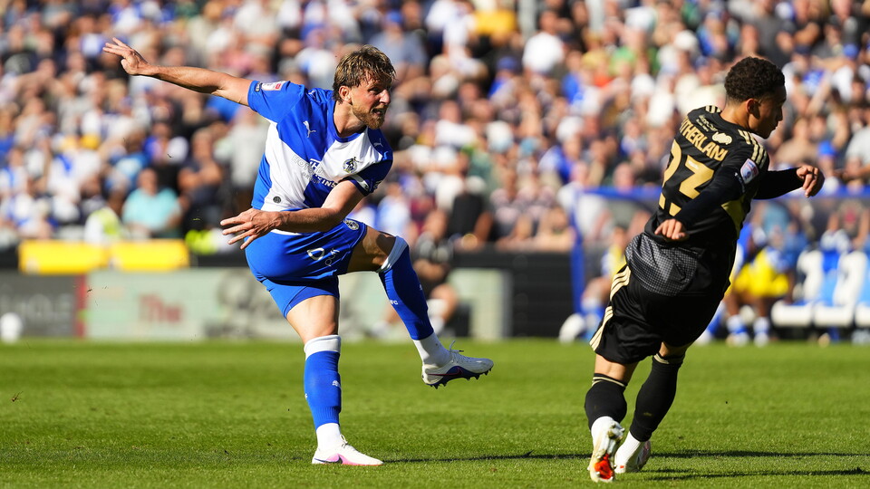 Alfie Kilgour kicks the ball