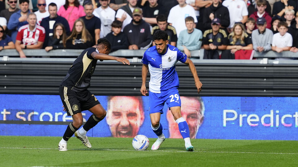 Fabrizio Cavegn has a one-on-one with an Exeter defender