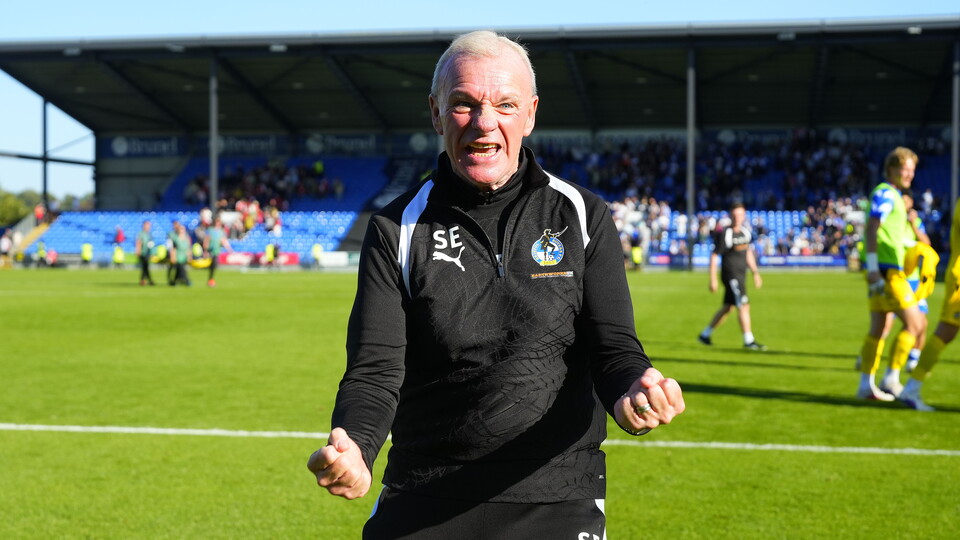 Steve Evans celebrates his team's win over Rotherham United
