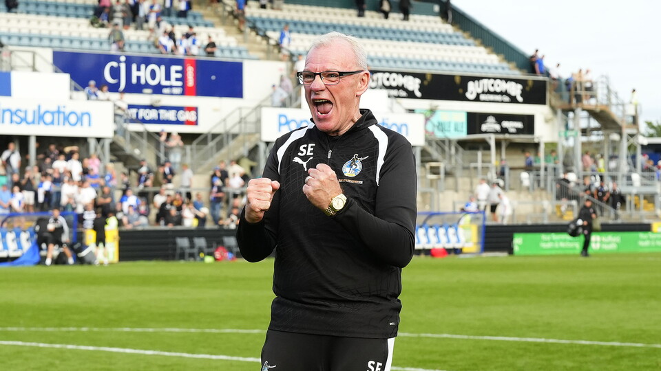 Steve Evans celebrates his team's win against Exeter City