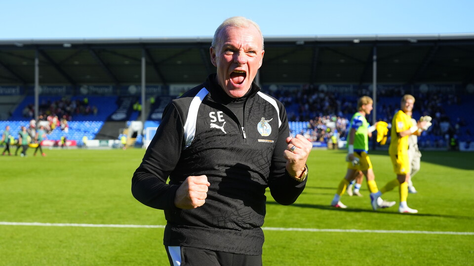 Steve Evans celebrates his team's win over Rotherham