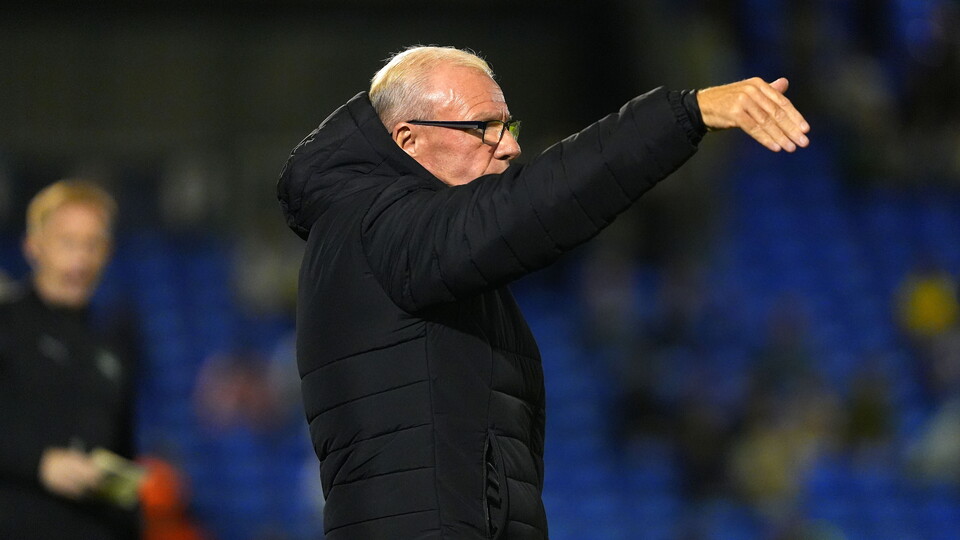 Steve directs his players during the match