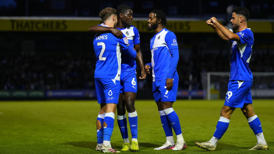 Tom James celebrates his goal with Clinton Mola, Shaq Forde and Fabrizio Cavegn