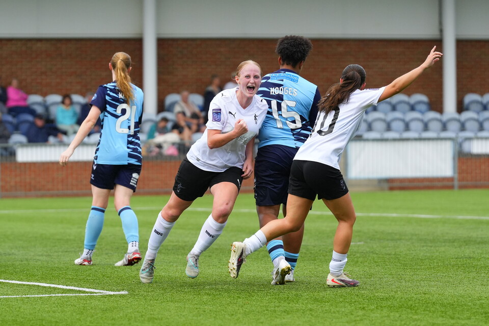 Libby Davies celebrating after scoring