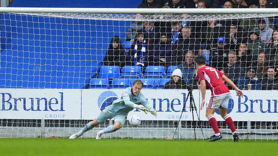 Brad Young saves Antwoine Hackford's strike
