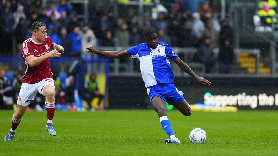 Clinton Mola kicking the ball