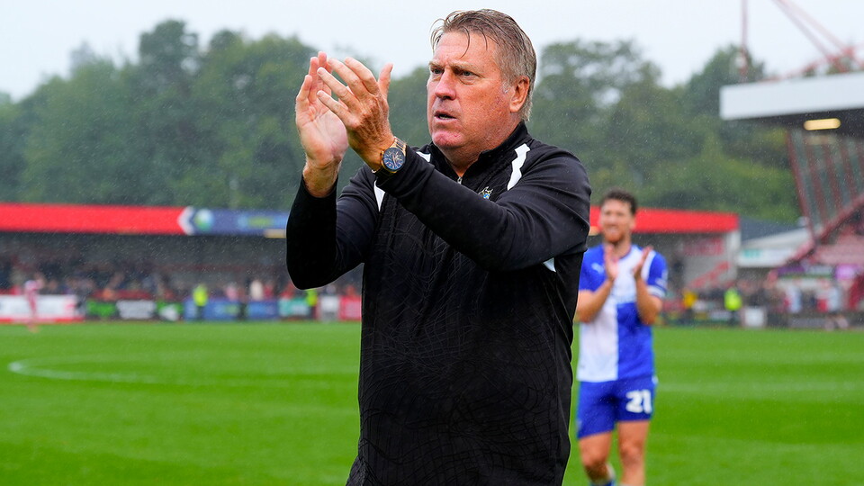 Paul Raynor claps the fans