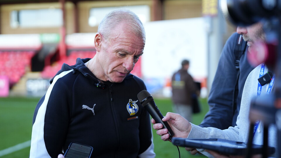 Steve Evans speaks to the media after the Crewe match