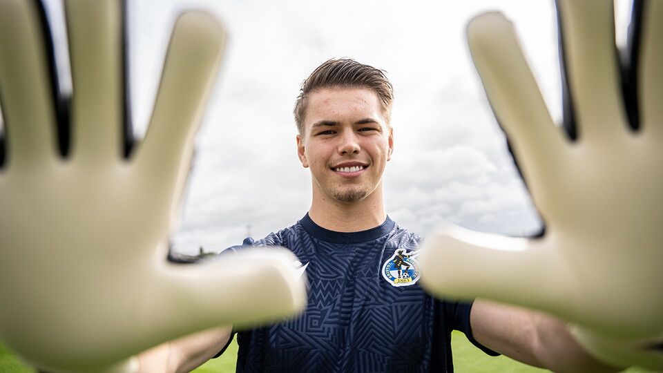 Josh Griffiths poses after signing for Bristol Rovers FC