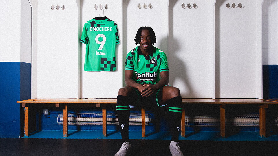 Promise Omochere signs