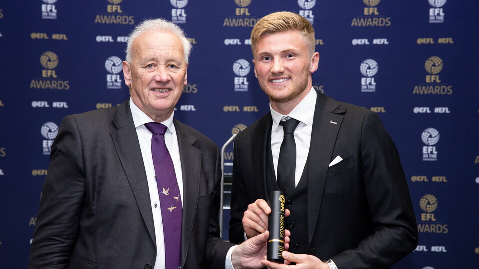 Taylor Moore receiving League One Community Player of the Year Award