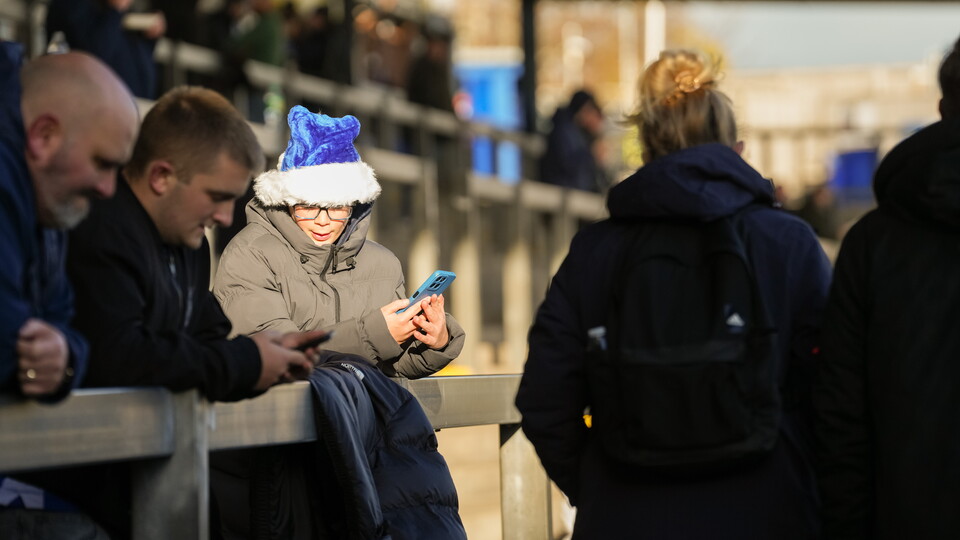 Bristol Rovers supporter wearing Santa hat