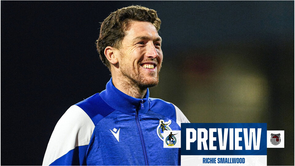 Richie Smallwood smiling at the Bristol Rovers fans