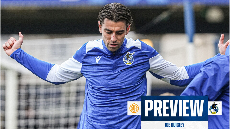 Joe Quigley warming up before a match