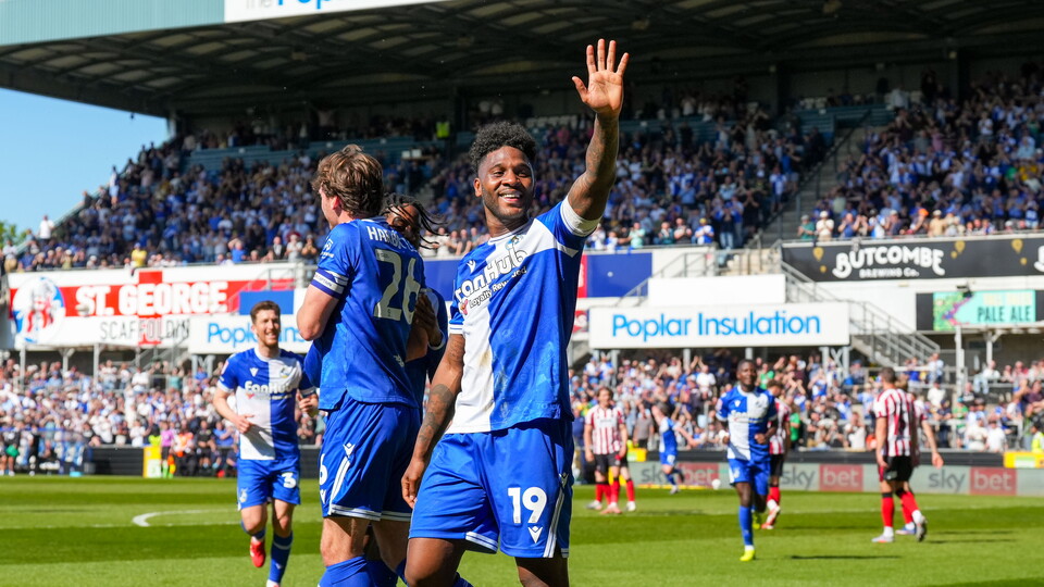 Ellis Harrison waving to fans after scoring goal