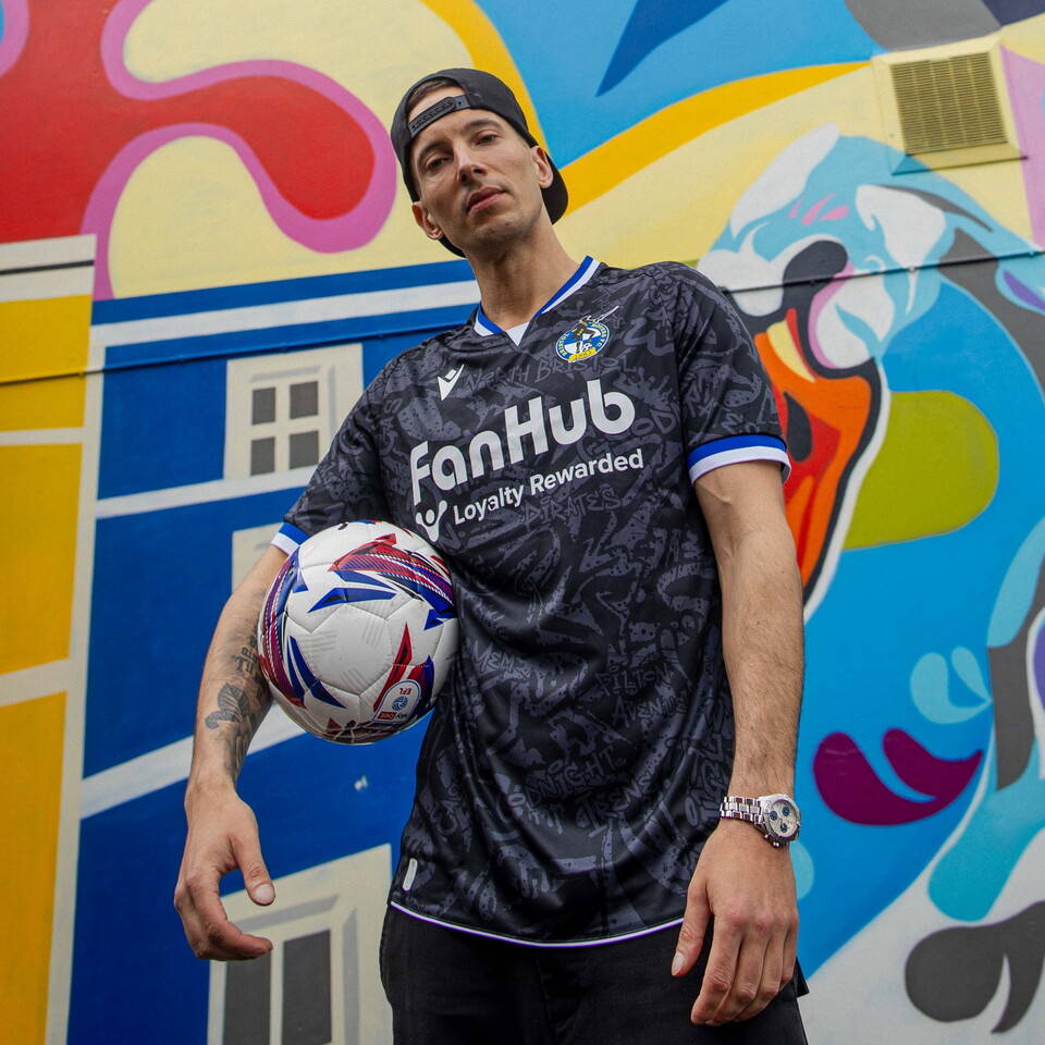 Blacksmith wearing Bristol Rovers 2025/26 Away Shirt